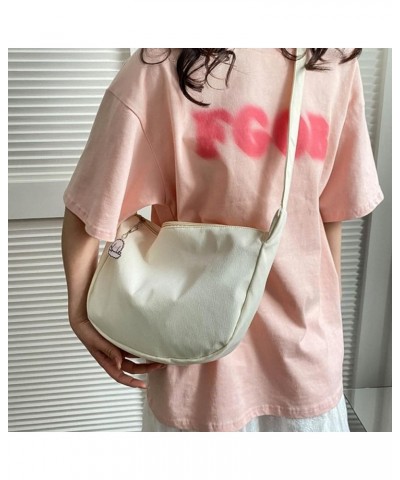 Versatile Single Shoulder Bag with Cute Pendant Harajuku Crossbody Bag Great for Daily Commute Shopping and College Black $8....