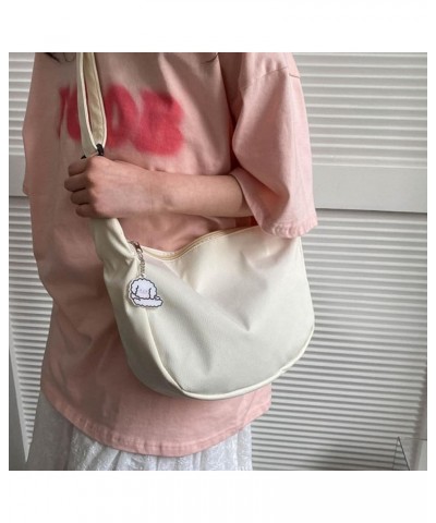 Versatile Single Shoulder Bag with Cute Pendant Harajuku Crossbody Bag Great for Daily Commute Shopping and College Black $8....