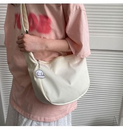 Versatile Single Shoulder Bag with Cute Pendant Harajuku Crossbody Bag Great for Daily Commute Shopping and College Black $8....